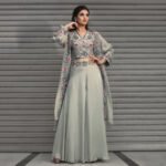 Oraganza jacket with sleve less embroired blouse with glare pallazo pants