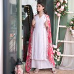 Cheveron pattern georgette suit with mirror embroiderd, paired with printed organza dupatta